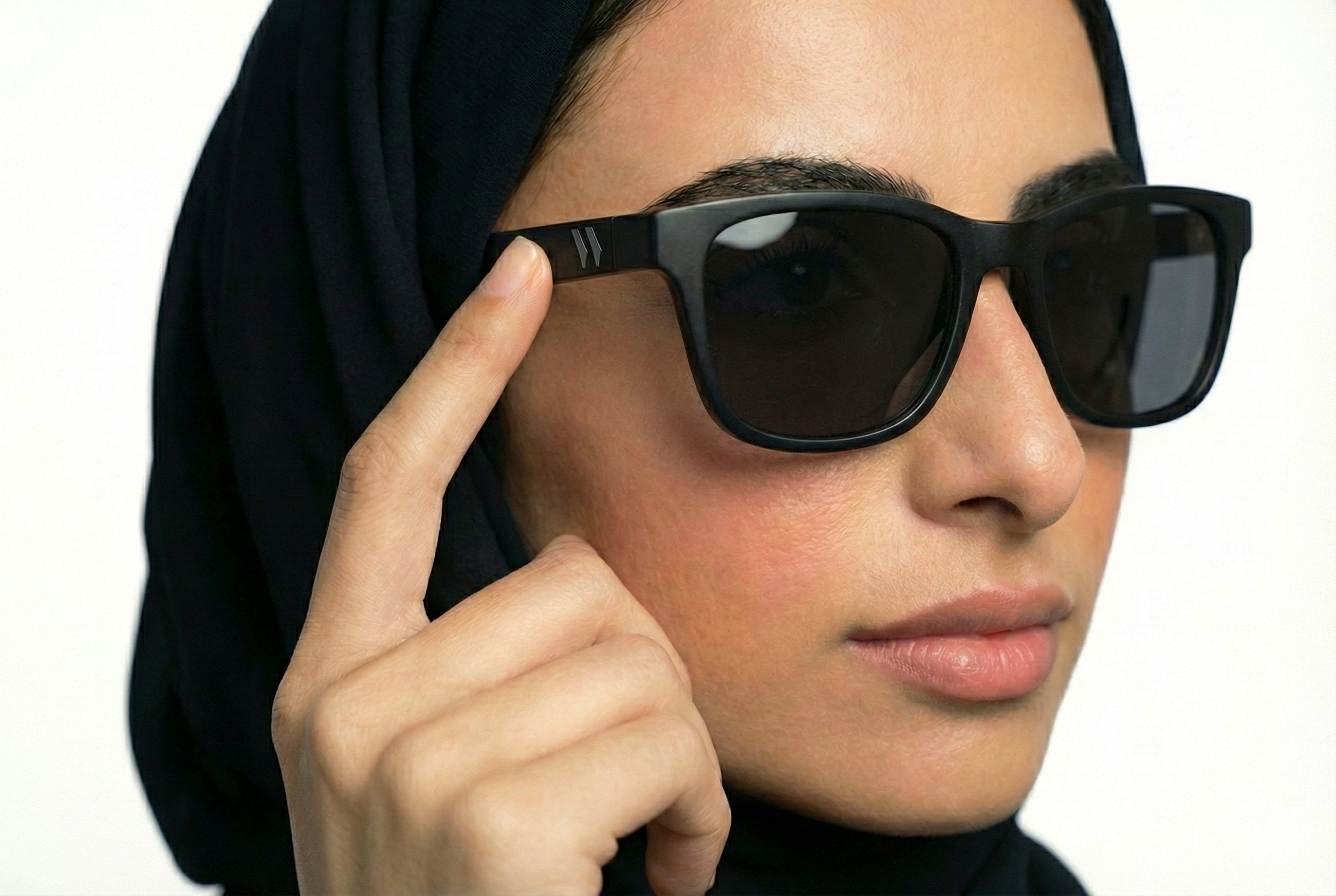 Model wearing WaSun glasses with tinted lenses outdoors